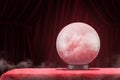 Magic ball on red table Royalty Free Stock Photo