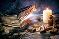 Magic book and witchery objects,  the practice of magic, enchantment, sorcery Royalty Free Stock Photo