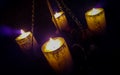 Magic candle light on chains Royalty Free Stock Photo