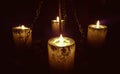 Magic candle light on chains Royalty Free Stock Photo