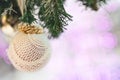 Magic christmas background for card, wallpaper. Christmas ball and coniferous coniferous branches with bokeh Royalty Free Stock Photo