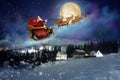Magic Christmas eve. Santa with reindeers flying in sky on full moon night Royalty Free Stock Photo