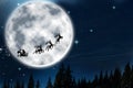 Magic Christmas eve. Santa with reindeers flying in sky Royalty Free Stock Photo