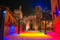 Magic colored square in the center of Gubbio at christmas time with snow