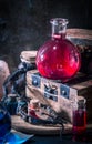 Magic concept. Red potion in bottle Royalty Free Stock Photo