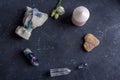 Magic flat lay composition with pink candle, crystals, pagan bag and flowers. Esoteric and pagan rituals, witchcraft Wiccan or