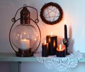 Burning black candles, old-fashioned lamp and pentagramBurning black candles, old-fashioned lamp and pentagram. Magic gothic ritua