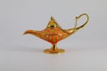 Magic lamp of Alladin on a dark and light background.