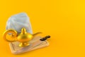 Magic lamp with kitchen board and chef`s hat Royalty Free Stock Photo