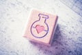 Magic Love Potion With A Heart Engraved On A Wooden Block On A Table