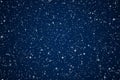 Magic, luxury and happy holidays background, silver sparkling glitter, stars and magical glow on dark blue abstract Royalty Free Stock Photo
