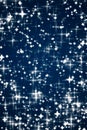 Magic, luxury and happy holidays background, silver sparkling glitter, stars and magical glow on dark blue abstract Royalty Free Stock Photo