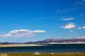 The magic of Mono Lake. Outliers - bizarre limestone calcareous tufa formation on the smooth water of the lake. Royalty Free Stock Photo