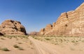 Magic mountain landscapes of Wadi Rum Desert, Jordan. Mountains in lifeless desert resemble Martian craters. Red sand and red rock Royalty Free Stock Photo