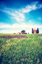 Magic nice landscape with rape flowers and chapel of Madonna di Vitaleta in background on a sunny day in San Quirico d`Orcia Val Royalty Free Stock Photo