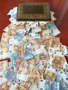 Magic old box overflowing with euro bank notes, european money fifty and twenty euros bills Royalty Free Stock Photo