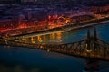 The magic panorama of the city at dusk, river, bridge and city l