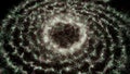 Magic particles spinning and becoming a cloud of energy with a ring in the center. Animation. Glowing tiny space dust