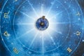 Magic pendant on blue horoscope like astrology, zodiac. esoteric topic