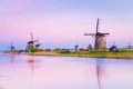 Magic picture of windmills on the river at dawn in Kinderdijk, N