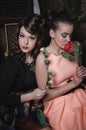 Magic portrait romantic beautiful couple of pretty girl with stylish hair, fashion make up, red lips, vintage dress