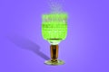 Magic potion green sparks in a crystal glass blue background
