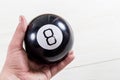 Magic prediction eight ball in hand Royalty Free Stock Photo