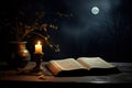 Magic ritual book and burning candles on the table in dark room with full moon view from the window