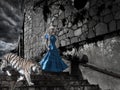 Magic scene- fantastic princess from fairy tale with a tiger on old tower steps