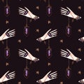 Magic seamless pattern. Woman& x27;s hand with a crystal on a chain and gold stars. Lithomancy. Mystical divination