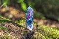 Magic still life with Gemstones fluorite crystal on nature background. Rocks for mystic ritual, witchcraft Wiccan or spiritual