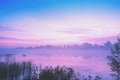 Magic sunrise over the lake. Misty early morning Royalty Free Stock Photo