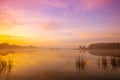 Magic sunrise over the lake. Misty early morning Royalty Free Stock Photo