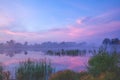 Magic sunrise over the lake. Misty early morning Royalty Free Stock Photo