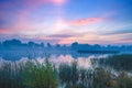 Magic sunrise over the lake. Misty early morning Royalty Free Stock Photo