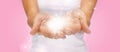 Magic twinkles or fairy dust on female hands Royalty Free Stock Photo