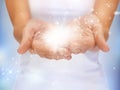 Magic twinkles on female hands Royalty Free Stock Photo