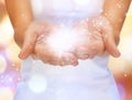 Magic twinkles on female hands Royalty Free Stock Photo