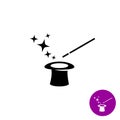 Magic wand with magician hat and stars black symbol Royalty Free Stock Photo