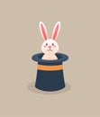 Magic white rabbit in a hat on light beige background. Royalty Free Stock Photo