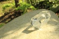 Magical amulet, glass in sunlight, sun rays effects, photo