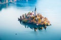 Magical autumn landscape with boat near island on Lake Bled Blejsko jezero, Julian Alps, Slovenia. Amazing places. Popular Royalty Free Stock Photo