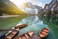 Magical beautiful fairy autumn landscape with boats on the lake Royalty Free Stock Photo