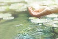 Magical contact between human hand and water Royalty Free Stock Photo