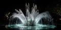 A magical fountain with water turning into sparkling stardust, representing the transformation of the ordinary into the