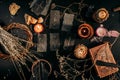 Magical items from above are spread out on a dark table. Halloween Royalty Free Stock Photo