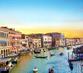 magical landscape with gondolas and boats on the Grand Canal in Venice, Italy at dawn. popular tourist attraction. Wonderful Royalty Free Stock Photo