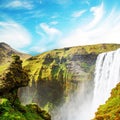 Magical landscape with silhouette of human head in front of waterfall Skogafoss in Iceland. Exotic countries. Amazing places. Royalty Free Stock Photo