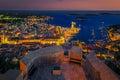 Magical medieval Hvar town lights with harbor at evening, Croatia