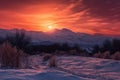 magical moment, with the sun rising behind snow-capped mountain range and illuminating the sky with warm colors